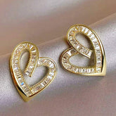 Elegant yellow gold hollowed heart shape ear studs with inlaid zircon accents