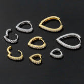 Simple temperament summer cool love ear clip in gold and silver with heart-shaped geometry design and rhinestone accents.