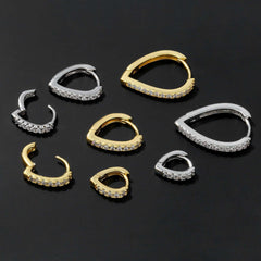 Simple temperament summer cool love ear clip in gold and silver with heart-shaped geometry design and rhinestone accents.