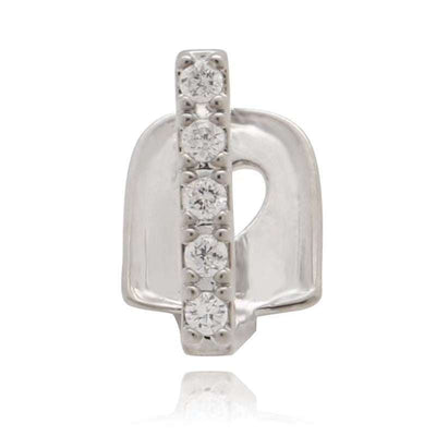 Close-up of silver zircon Teeth Joint dental accessory with five rhinestones