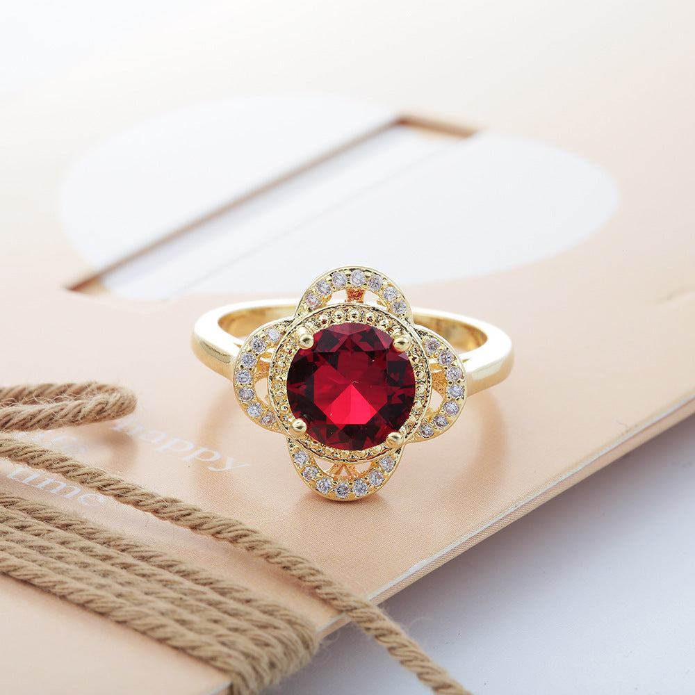 Copper inlaid zircon ring with red center stone and electroplated copper band in fruit shape