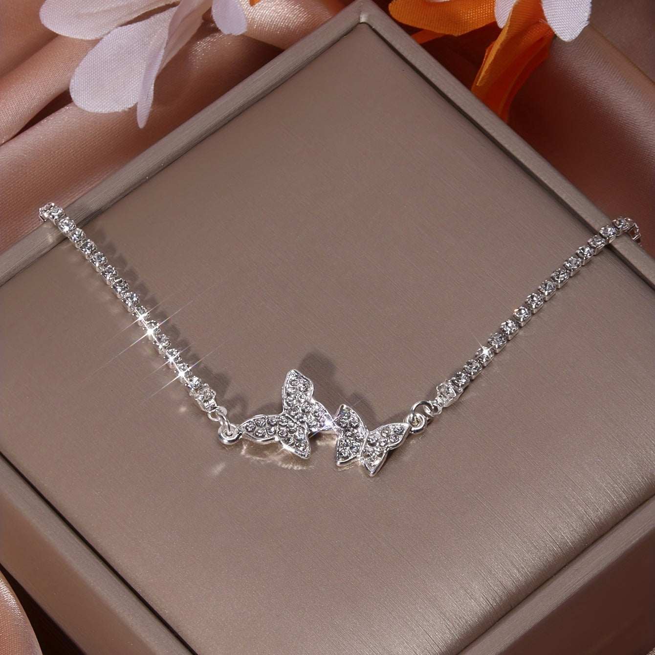 Design high-grade inlaid rhinestone butterfly anklet in silver alloy with geometric shape and sparkling stones