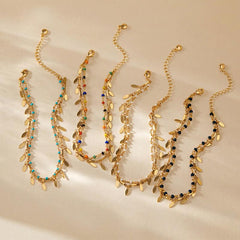 Beach layered retro 18K gold plated copper anklets with colorful beads and leaf charms.