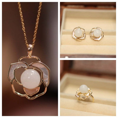 Natural Hetian White Jade necklace, ring, and earrings set with gold floral design
