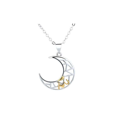 Silver crescent moon pendant necklace with gold tooth charm on chain