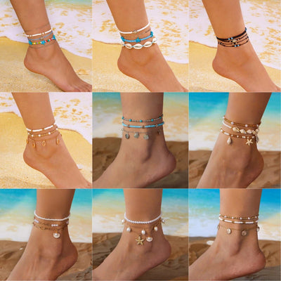 Set of starfish conch shell pearl multi-layer anklets on a beach background