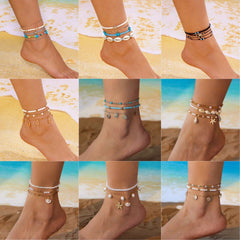 Set of starfish conch shell pearl multi-layer anklets on a beach background
