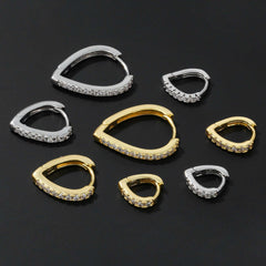 Simple Temperament Summer Cool Love Ear Clips in gold and silver heart-shaped copper with rhinestones on black background